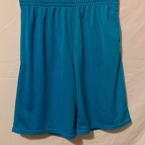 Turquoise blue shorts.